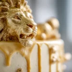 Gold Drip Cake with a Lion Topper