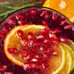 Sparkling Pomegranate Champagne Punch – A brunch delight! 3 Sparkling Pomegranate Champagne Punch in a glass