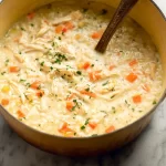 Creamy Chicken and Rice Soup — Comforting and Delicious 3 Creamy Chicken and Rice Soup in a Bowl
