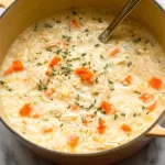 Hearty Creamy Chicken and Rice Soup — Filling Family Favorite 3 Hearty Creamy Chicken and Rice Soup in a Bowl
