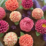 Colorful Flower Cupcake Display: Beautifully Decorated Cupcakes