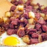 Corned Beef Hash with Crispy Potatoes: A Delicious Delight 3 Corned Beef Hash with Crispy Potatoes Plate