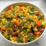 Indian Style Oats Upma: A Healthy Breakfast Delight 3 Indian Style Oats Upma Served in a Bowl