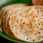 Instant Sponge Dosa: A Deliciously Quick Treat 3 Delicious Instant Sponge Dosa on a Plate