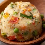 Vegetable Upma: A Wholesome and Delicious Breakfast Delight 3 Colorful Vegetable Upma Served in a Bowl