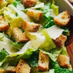 Delicious Caesar Salad with Croutons and Parmesan