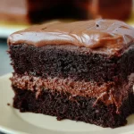 Delicious Chocolate Cake Sliced on a Plate