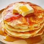 Classic Pancakes: The Joy of Fluffy Mornings 3 Classic Pancakes Stack with Maple Syrup