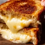 Grilled Cheese Sandwich: The Ultimate Comfort Food Delight 3 Delicious Grilled Cheese Sandwich Melting with Cheese