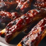 BBQ Ribs: The Ultimate Taste Sensation You Can't Miss 3 Delicious BBQ Ribs Ready to Impress at Your Grill Party