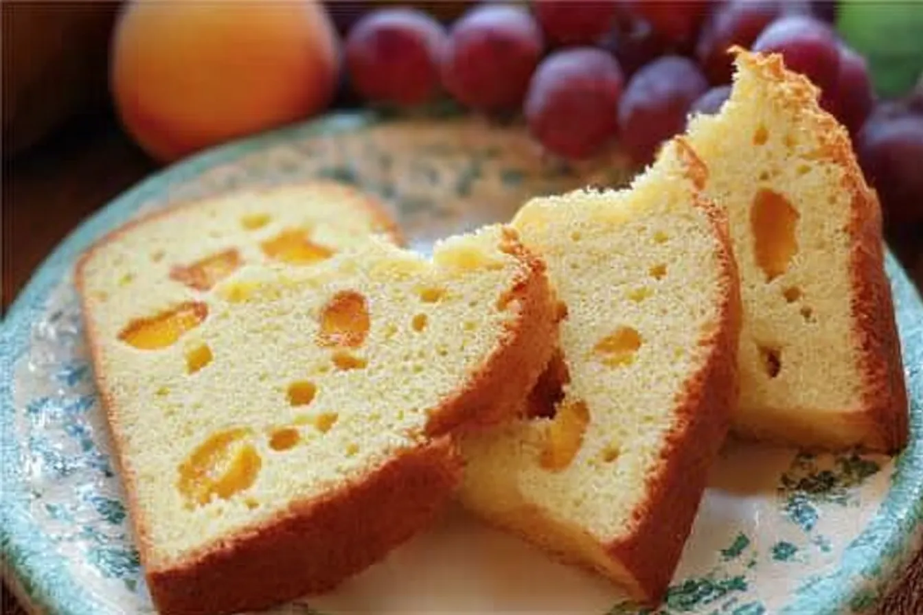 Fresh Peach Pound Cake: A Sweet Summer Delight 1 Fresh Peach Pound Cake Slice on a Plate