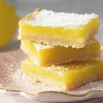 Lemon Bars: A Sweet and Tart Delight You Can’t Resist 3 Delicious Lemon Bars Ready for Your Next Dessert Table