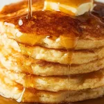 Pancakes Made Easy: Fluffy Perfection Awaits! 3 Fluffy Pancakes Stack with Syrup Drizzle