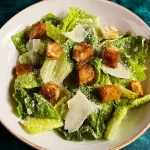 Classic Caesar Salad with Homemade Dressing on a Plate
