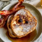 French Toast Delight: The Perfect Breakfast Treat! 3 Perfectly Golden French Toast on a Plate