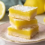 Lemon Bars: Delightful Treat That'll Brighten Your Day! 3 Lemon Bars Freshly Baked and Ready to Enjoy