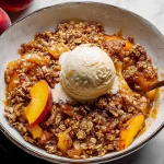 Fresh Peach Crisp with Vanilla Ice Cream Ready to Enjoy