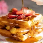 Waffles: The Ultimate Delicious Breakfast Treat 3 Fluffy Waffles with Fresh Berries and Syrup