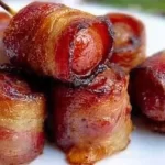 Crispy Bacon Wrapped Kielbasa Bites: A Flavor Explosion! 3 Crispy Bacon Wrapped Kielbasa Bites Platter