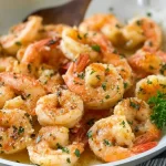 Garlic Butter Shrimp Served with Lemon and Herbs