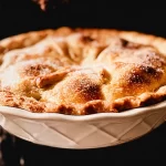 Freshly Baked Apple Pie on Rustic Table