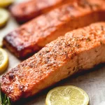 Baked Salmon: A Deliciously Simple Recipe to Enjoy 3 Baked Salmon on a Plate - Delicious and Healthy Meal