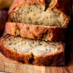 Delicious Homemade Banana Bread Sliced on a Plate