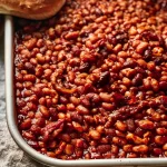 BBQ Baked Beans: The Ultimate Comfort Food Delight! 3 BBQ Baked Beans in a Cast Iron Skillet