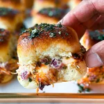BBQ Chicken Sliders: A Deliciously Easy Crowd-Pleaser 3 BBQ Chicken Sliders Served on a Wooden Board