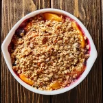 Blueberry Peach Crisp: A Delightful Summer Dessert 3 Fresh Blueberry Peach Crisp Ready to Serve