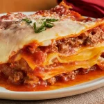 Classic Beef Lasagna: Unforgettable Comfort Food Recipe 3 Classic Beef Lasagna in a Baking Dish