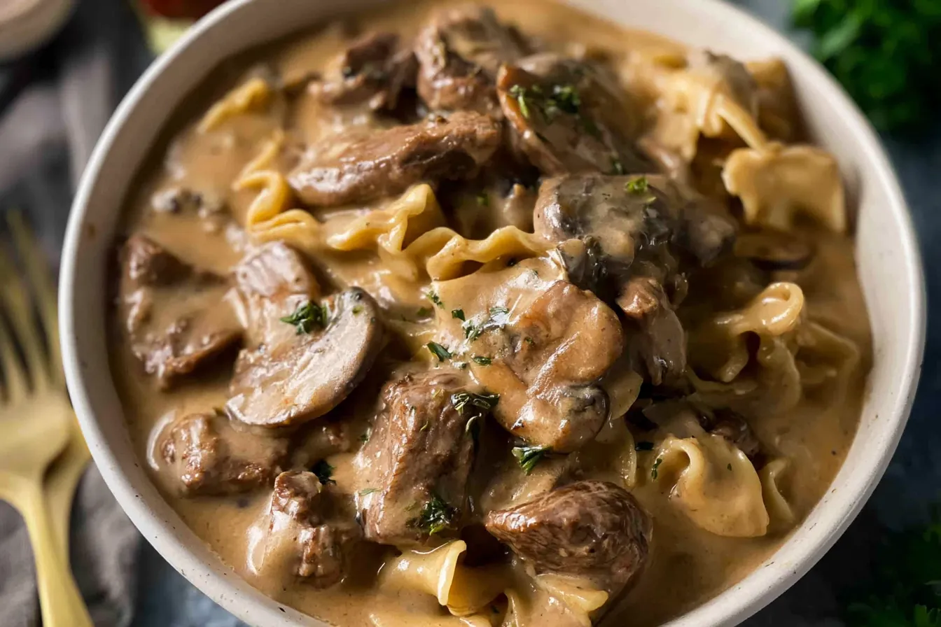 Classic Beef Stroganoff: A Comforting Delight for Dinner Classic Beef Stroganoff Served with Noodles