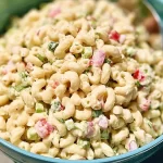 Classic Macaroni Salad: The Ultimate Crowd-Pleaser Recipe 3 Classic Macaroni Salad in a White Bowl