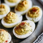 Deviled Eggs Delight: A Must-Try Classic Recipe 3 Deviled Eggs on a Platter Ready to Serve