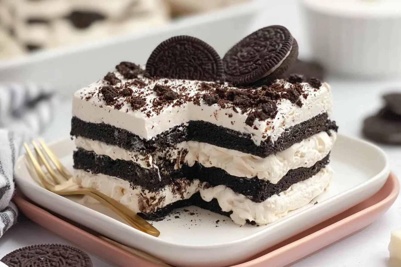 Oreo Icebox Cake: The Ultimate No-Bake Dessert Delight Oreo Icebox Cake Slices on a Plate