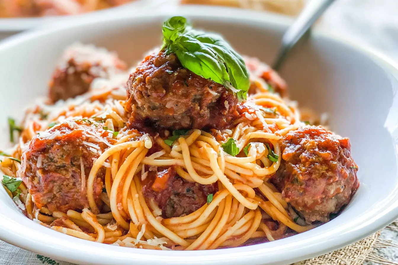 Spaghetti and Meatballs: A Heartwarming Comfort Dish Delicious Spaghetti and Meatballs Served on a Plate