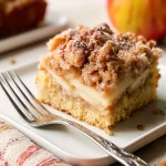 Freshly Baked Apple Streusel Coffee Cake on a Plate