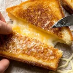 Grilled Cheese Sandwich: The Ultimate Comfort Food Delight 3 Delicious Grilled Cheese Sandwich with Melting Cheese