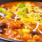 Bowl of Slow Cooker Turkey Chili Topped with Avocado